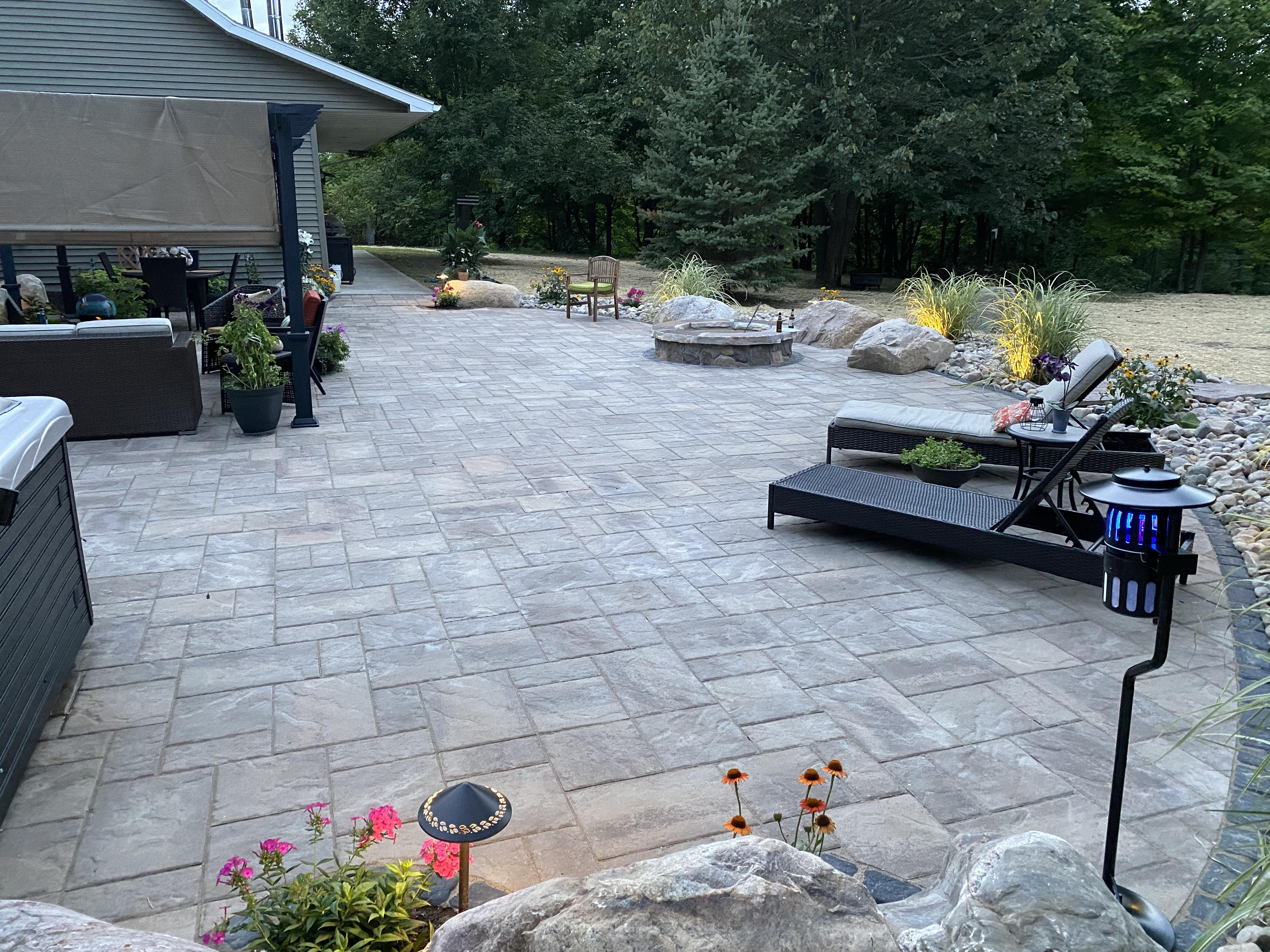 Paver Patio with Wood Fire Pit & Cobblestone Stream